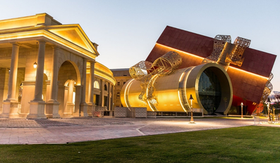 Visitors explore artworks at the summer fine arts exhibition in Katara
